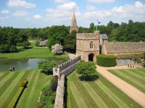 The church, the gate house and curtain wall and moat of Broughton Castle dating from the 14th century. The Great Hall is in near original condition and the photo was taken from the roof.