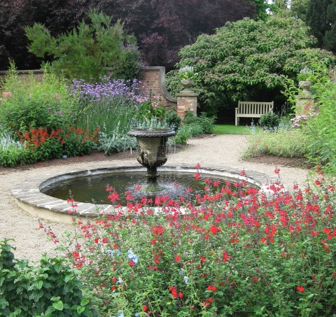 Fountain at the centre of a small walled garden at Newby Hall in Yorkshire.