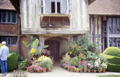 The front of the 15th C timbered house with Christopher Lloyd standing to the left.